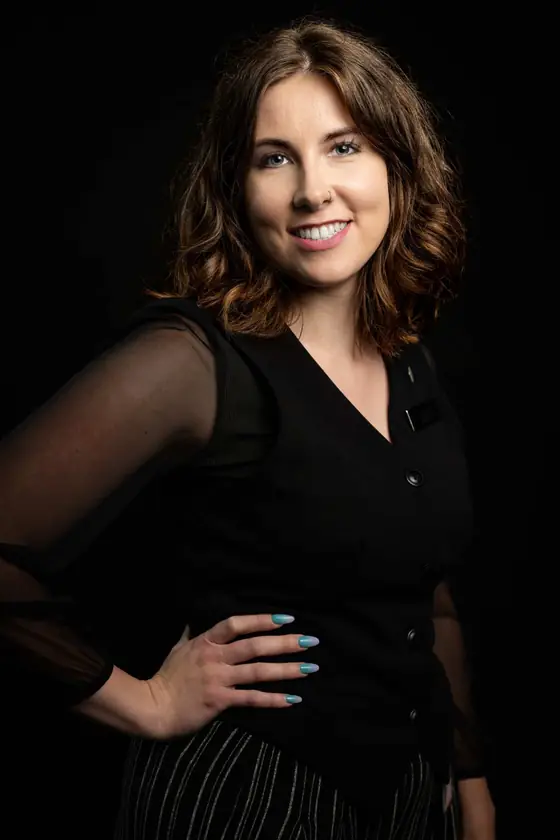Studio portrait against a black backdrop by Ken Floyd Media